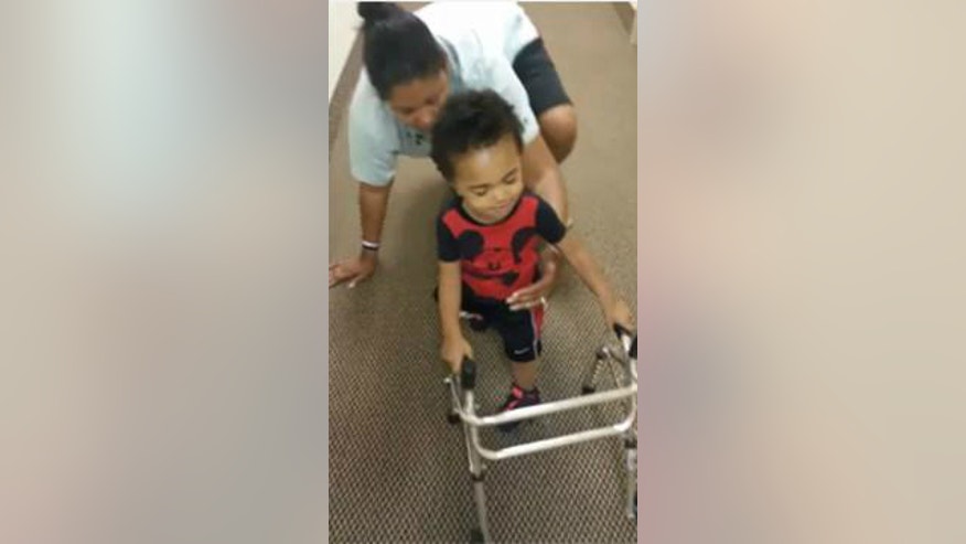 Kayden first steps.jpg